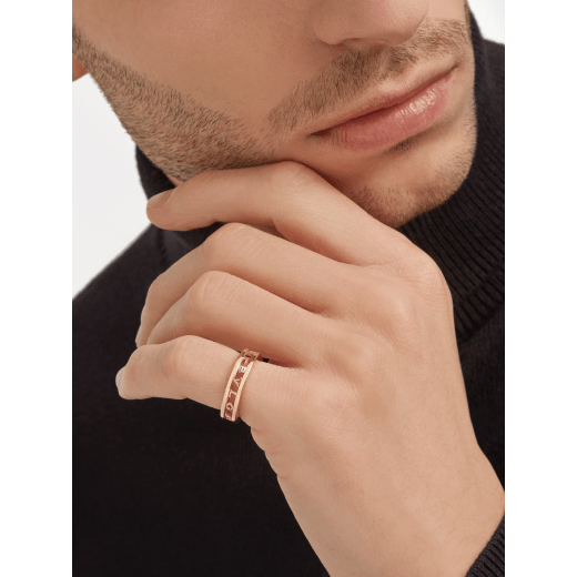 B.zero1 couples' rings in 18 kt white and rose gold with an openwork Bulgari logo. A distinctive ring set fusing visionary design with bold charisma. BZERO1-COUPLES-RINGS-8 image 5