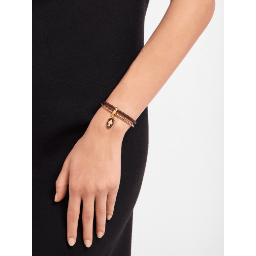 Serpenti Forever bracelet in chestnut opal braided calf leather and gold-plated brass chain with magnetic clasp closure. Captivating snakehead charm with black enamel and gold-plated scales, and black enamel eyes. SERP-BRAID-CHAIN-chestopal image 3