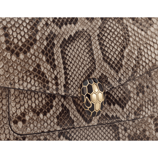 Serpenti Forever medium shoulder bag in foggy opal grey shiny python skin with crystal rose nappa leather lining. Captivating snakehead magnetic closure in light gold-plated brass embellished with black enamel and light gold-plated brass scales, and black onyx eyes. 293336 image 5