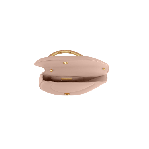 Serpenti Cuore 1968 top handle bag in star rose pink calf leather with crystal rose nappa leather lining. Captivating snake body-shaped top handle in gold-plated brass embellished with star rose pink enamel scales and zirconia eyes; press-button closure. SRN-001-1326S image 4