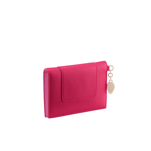 Serpenti Forever folded card holder in coral carnelian orange calf leather with flamingo quartz pink nappa leather interior. Captivating light gold-plated brass snakehead charm with red enamel eyes, and press-stud closure. SEA-CC-HOLDER-FOLD-Cla image 3