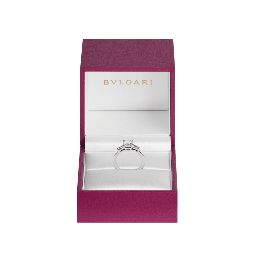 Griffe solitaire ring in platinum with princess cut diamond and two side diamonds. Available in 1 ct. A classic setting that allows the beauty and the pureness of the solitaire diamond to assert itself. 338560 image 5