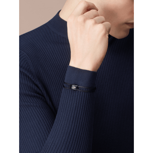 "Serpenti Forever" bracelet in Midnight Sapphire blue fabric with an alluring snakehead décor in light gold-plated brass enamelled in black and glittery Hawk's Eye grey, with seductive black enamel eyes. SERP-STRINGd image 3