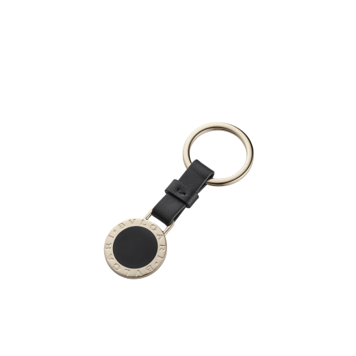 BULGARI BULGARI keyring in black calf leather with light gold-plated brass iconic décor embellished with a black enamel insert and brisé ring. 32764 image 1