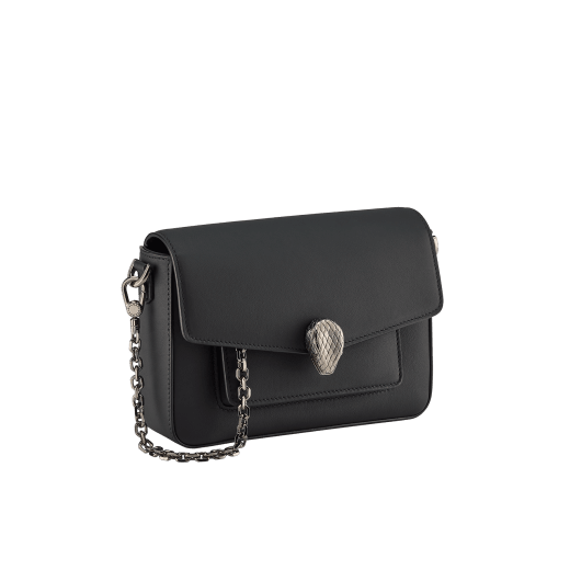 Serpenti Forever small unisex crossbody bag in matt black calf leather with black nappa leather lining and decorative chain. Captivating snakehead closure in dark ruthenium-plated brass embellished with red enamel eyes. 293022 image 2