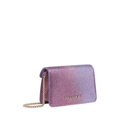 Serpenti Forever micro bag in sheer amethyst lilac Gleamy karung skin with primrose quartz pink nappa leather interior. Captivating magnetic snakehead closure in light gold-plated brass embellished with red enamel eyes. 292934 image 3