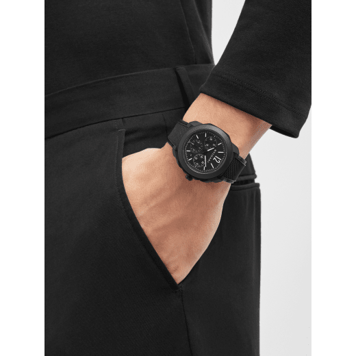 Octo Roma automatic watch with interchangeable black rubber strap and additional black alligator bracelet, stainless steel case with black DLC treatment and black Clous de Paris dial. Mechanical manufacture movement with automatic winding and chronograph. Water-resistant up to 100 metres 103932 image 1