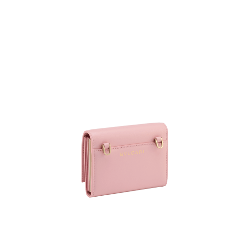 Serpenti Forever crossbody card holder in primrose quartz pink Metropolitan calf leather with flamingo quartz pink, primrose quartz pink and ivory opal nappa leather side details, and black moiré lining. Captivating magnetic snakehead closure in light gold-plated brass embellished with red enamel eyes. 292837 image 3