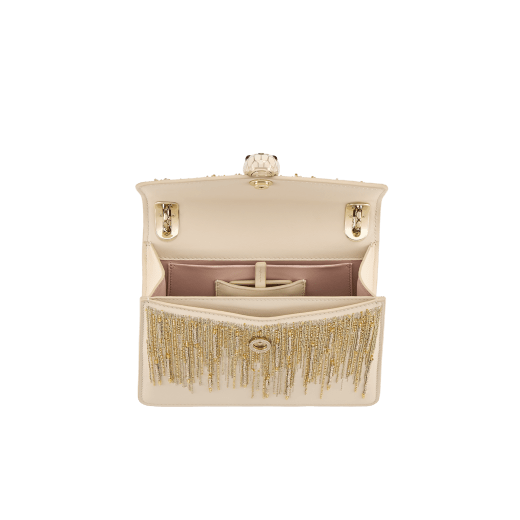 Serpenti Forever Day-to-Night small shoulder bag in ivory opal Ray of Light calf leather with crystal rose pink nappa leather lining. Captivating snakehead magnetic closure in light gold-plated brass embellished with ivory opal enamel and light gold-plated brass scales, and black onyx eyes. 293860 image 4