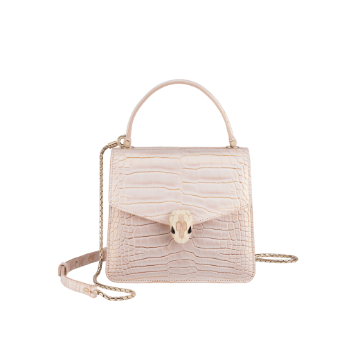 Serpenti Forever small top handle bag in white Moonpearl alligator skin with crystal rose nappa leather lining. Captivating snakehead magnetic closure in light gold-plated brass embellished with white agate enamel and pink quartz scales and black onyx eyes. 293468 image 1