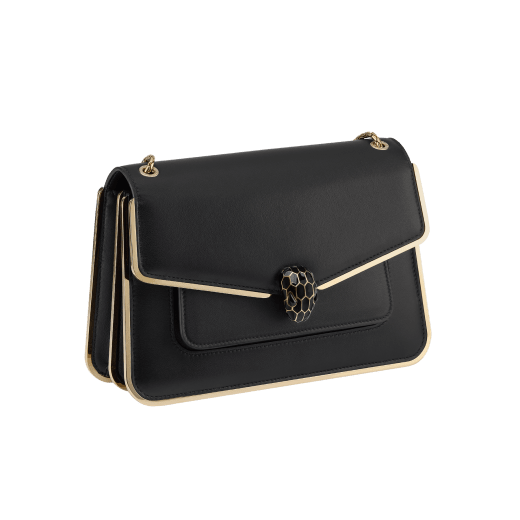 Serpenti Forever medium shoulder bag in black Metropolitan calf leather with light gold-plated brass frames and black nappa leather lining. Captivating snakehead magnetic closure in light gold-plated brass embellished with black enamel scales, and black onyx eyes. 1077-MF image 2