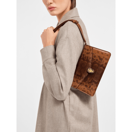 Serpenti Forever small crossbody bag in Smeraldo Prezioso shiny karung with Smeraldo Prezioso nappa leather lining. Captivating snakehead magnetic closure in gold-plated brass embellished with black enamel and gold-plated brass scales, and black onyx eyes. SEA-001-1345S-ex image 1