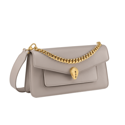 Serpenti East-West Maxi Chain medium shoulder bag in foggy opal grey Metropolitan calf leather with linen agate beige nappa leather lining. Captivating snakehead magnetic closure in gold-plated brass embellished with grey agate scales and red enamel eyes. SEA-1238-MCCL image 5