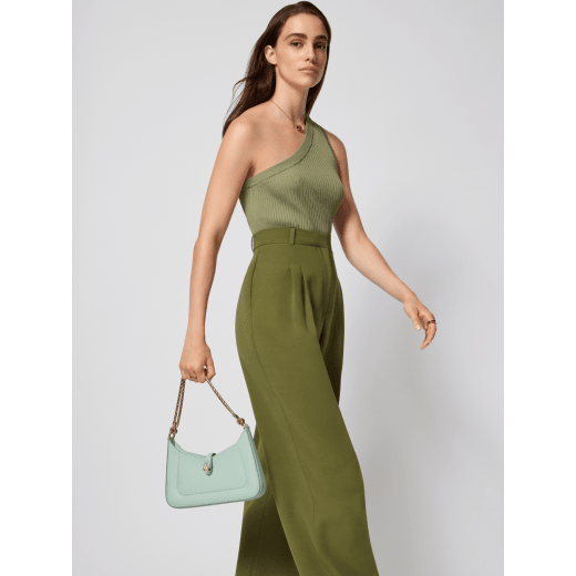 Serpenti Baia small shoulder bag in aquamarine Metropolitan calf leather with foggy opal grey nappa leather lining. Captivating snakehead magnetic closure in light gold-plated brass embellished with aquamarine enamel and light gold-plated brass scales, and black onyx eyes; additional zipped top closure. 293631 image 1