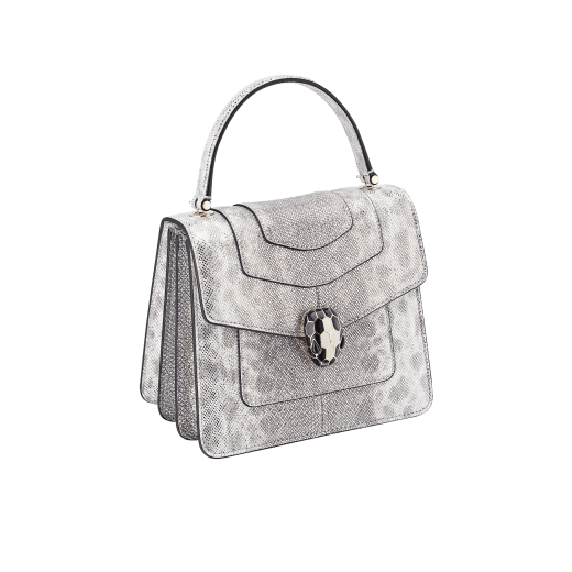 Serpenti Forever small top handle bag in white agate metallic karung skin with black nappa leather lining. Captivating snakehead closure in light gold-plated brass embellished with black and white agate enamel scales and black onyx eyes. 1122-MK image 2