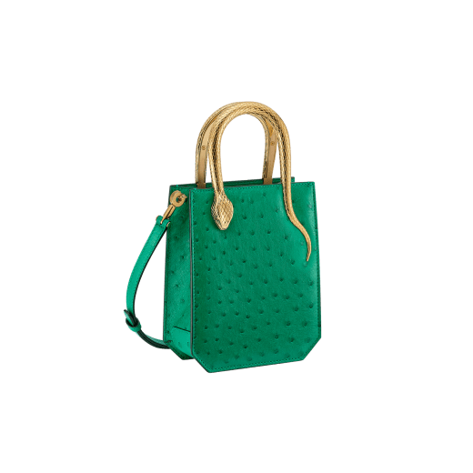 Serpentine mini tote bag in vivid emerald green shiny ostrich skin with vivid emerald green nappa leather lining. Captivating snake body-shaped handles in gold-plated brass embellished with engraved scales and red enamel eyes. 293262 image 2