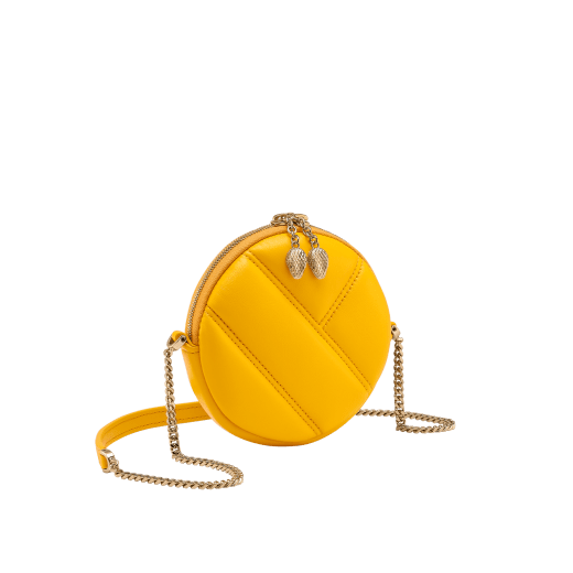 Serpenti Cabochon round pouch in azalea quartz pink calf leather with a maxi matelassé pattern and beetroot spinel fuchsia nappa leather interior. Captivating snakehead zip pullers in light gold-plated brass embellished with red enamel eyes, and zipped fastening. SCB-ROUNDPOCHETTE image 1