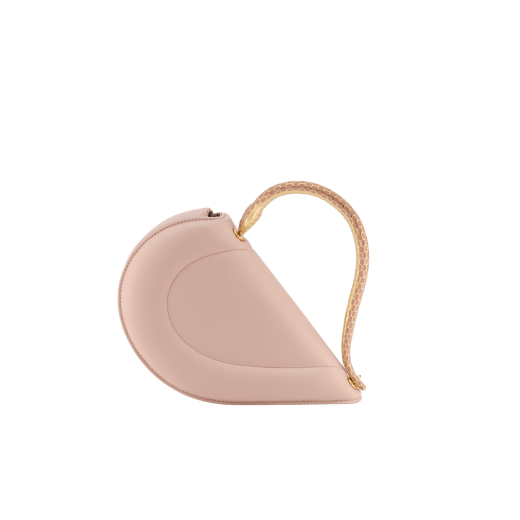 Serpenti Cuore 1968 top handle bag in star rose pink calf leather with crystal rose nappa leather lining. Captivating snake body-shaped top handle in gold-plated brass embellished with star rose pink enamel scales and zirconia eyes; press-button closure. SRN-001-1326S image 7