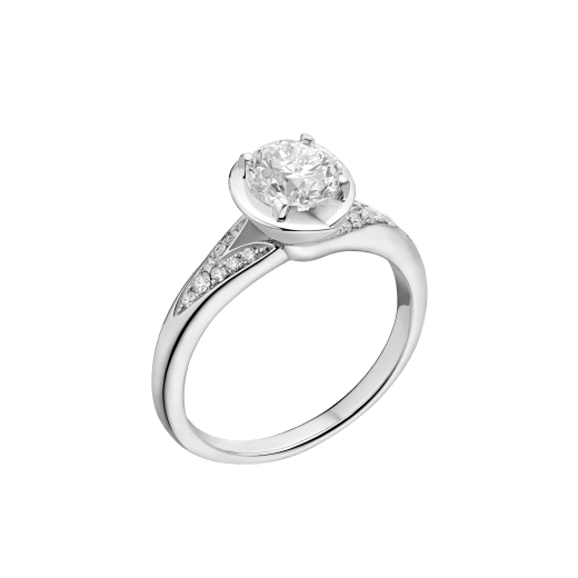 Incontro d’Amore ring in platinum with round brilliant-cut diamond and pavé diamonds. Available from 0.20 ct. As its pavé rows embrace a diamond apex, Incontro d’Amore joins two hearts as one. 352213 image 1