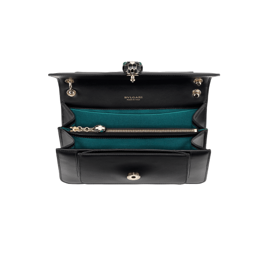 Serpenti Forever medium shoulder bag in black calf leather with emerald green grosgrain lining. Captivating snakehead closure in light gold-plated brass embellished with black and white agate enamel scales and green malachite eyes. 1077-CLa image 4