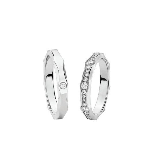Infinito Eheringe aus Platin, einer voll ausgefasst mit Diamant-Pavé. Das zeitlose Ring-Set für Paare spielt mit seinem erlesenen Design auf das Symbol der Unendlichkeit an. INFINITO-COUPLES-RINGS-2 image 1
