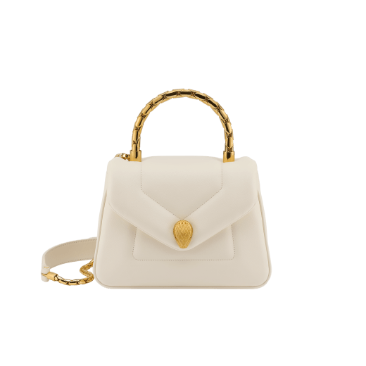 Serpenti Reverse small top handle bag in black quilted Metropolitan calf leather with black nappa leather lining. Captivating snakehead magnetic closure in gold-plated brass embellished with red enamel eyes. 1234-MCL image 6