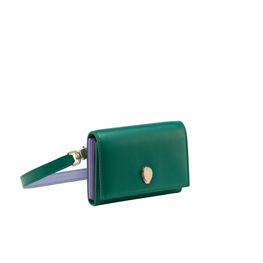 Serpenti Forever crossbody card holder in jade green Metropolitan calf leather with amethyst purple, lavender and sheer amethyst lilac nappa leather side details, and black moiré lining. Captivating magnetic snakehead closure in light gold-plated brass embellished with red enamel eyes. 292836 image 1