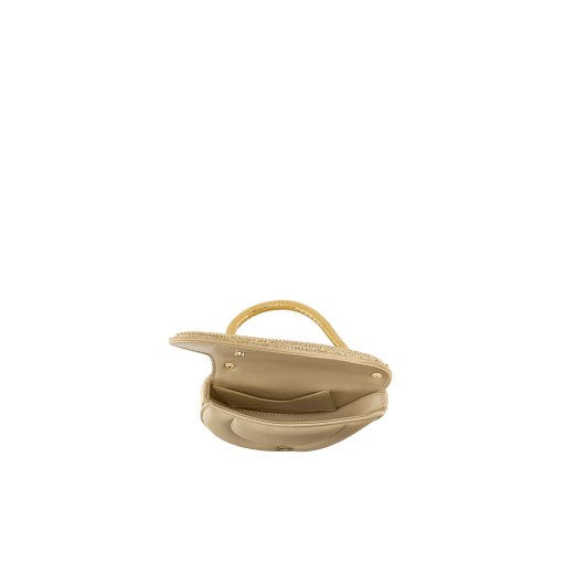 Serpenti Cuoricino mini top handle bag with gold Neige Pavé Crystals applied on a suede base and bright Travertino nappa leather lining. Captivating snake body-shaped top handle in gold-plated brass embellished with engraved scales; press-button closure. 295410 image 3