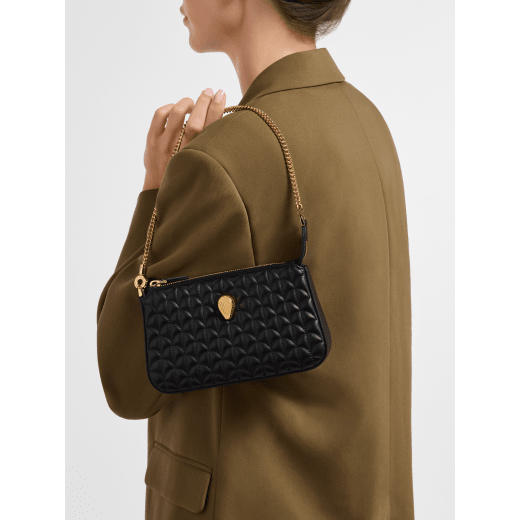 Serpenti Sugarloaf chain clutch in royal ruby Calla Matelassé calf leather with a quilted pattern, royal ruby nappa leather lining and a zipped closure. Captivating snakehead rivet in gold-plated brass finished with red enamel eyes. SSL-CHAINCLUTCH image 1