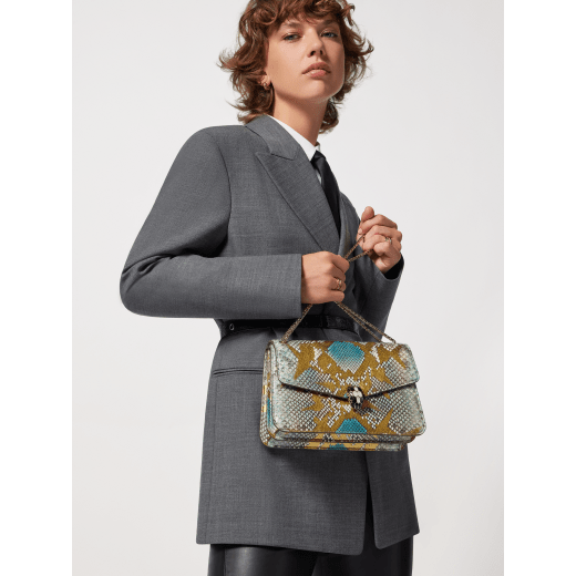 Serpenti Forever shoulder bag in multicolour Early Bright python skin with caramel topaz beige nappa leather lining. Captivating snakehead closure in light gold-plated brass embellished with black and caramel topaz beige enamel scales and black onyx eyes. 1140-P image 6