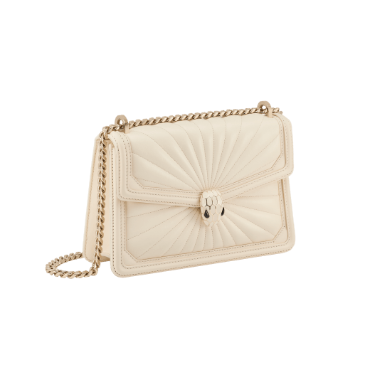 Serpenti Diamond Blast small shoulder bag in ivory opal Sunshine quilted nappa leather with black nappa leather lining. Captivating snakehead closure in light gold-plated brass embellished with matt and shiny ivory opal enamel scales and black onyx eyes. 922-SQ image 2