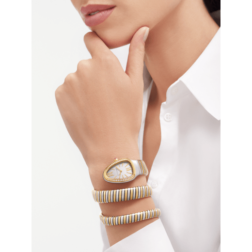 Serpenti Tubogas double-spiral watch in 18 kt yellow gold and stainless steel with diamond-set bezel and silver opaline dial with guilloché soleil treatment. Water-resistant up to 30 meters 103797 image 1