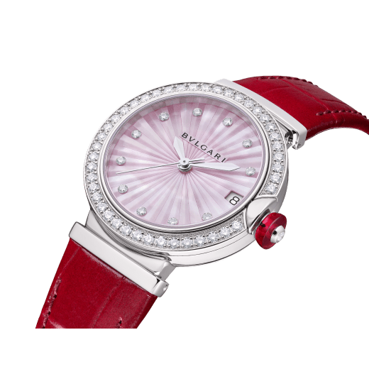 LVCEA Lady Watch , 28 mm stainless steel case and crown with a synthetic cabochon-cut rubellite and 1 round diamond. Pink mother-of-pearls dial intarsio marquetery with 11 round brilliant cut diamonds indexes. Mechanical movement with automatic winding, hours, minutes, seconds and date functions. Frequency 28'800 VpH (4Hz), 25 jewels. Diameter: 25.60 mm, thickness: 3.60mm, Power reserve 42 hours. Pink alligator strap with stitches links to the case set with diamonds and steel ardillon buckle. Water proof 50 m. 103618 image 2
