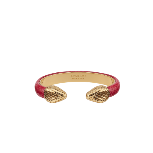 Serpenti Forever bangle bracelet in gold-plated brass with amaranth garnet pure karung inserts. Captivating contraire snakehead motif in gold-plated brass. BRACLT-SP-CONTR-LNY image 1