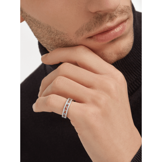 B.zero1 couples' rings in 18 kt white and yellow gold with an openwork Bulgari logo. A distinctive ring set fusing visionary design with bold charisma. BZERO1-COUPLES-RINGS-4 image 6