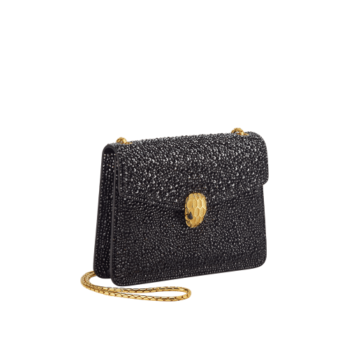 Serpenti Forever small crossbody bag in natural suede with different-size gold crystals and black nappa leather lining. Captivating magnetic snakehead closure in gold-plated brass embellished with "diamantatura" engraving on the scales, and black onyx eyes. 422-CLf image 2