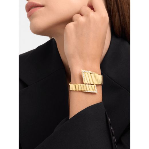 Bvlgari Tubogas asymmetric 18 kt yellow gold bracelet set with demi pavé diamonds BR860836 image 1