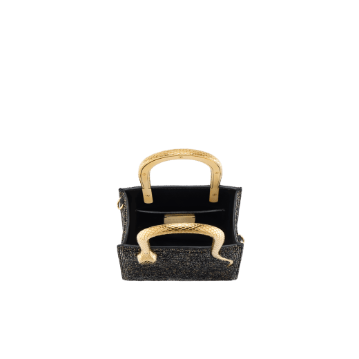 Serpentine mini tote bag in ivory opal Ray of Light calf leather with crystal rose pink nappa leather lining. Captivating snake body-shaped handles in light gold-plated brass embellished with engraved scales and red enamel eyes. SRN-1223-W image 4