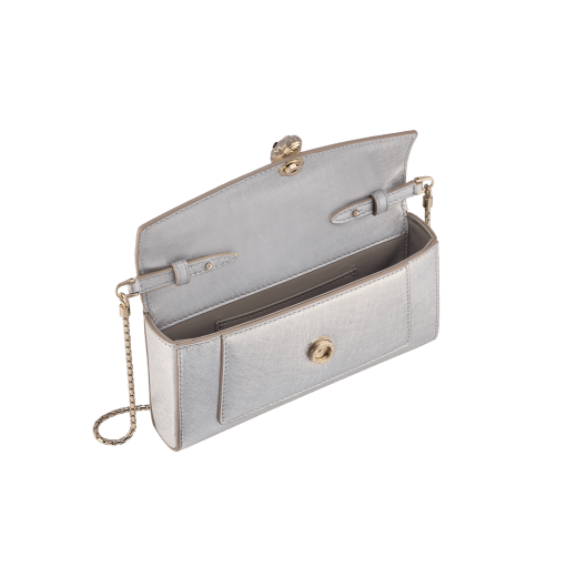 Serpenti Forever phone case in flash diamond calf leather with emerald green nappa leather lining. Captivating snakehead magnetic closure in palladium-plated brass embellished with white enamel and palladium-plated brass scales, and black onyx eyes. SEA-PHONEPOUCH image 2