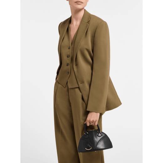 Marquise small top handle bag in black goat leather with black nappa leather lining and zipped closure. Detachable signature black goat leather charm with mirror. DAS-001-1325S image 2