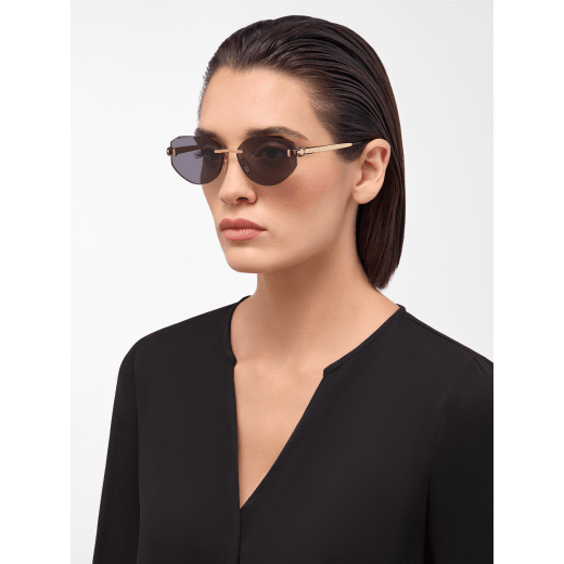 Serpenti Forever oval rimless sunglasses with enamelled snakehead embellishment 904376 image 1