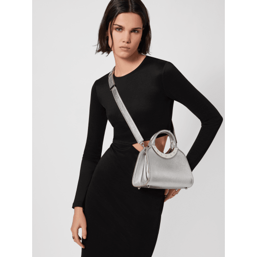 Bulgari Roma small top handle bag in black Metropolitan calf leather with black nappa leather lining. Iconic metal detail in antique gold-plated brass engraved with the BULGARI logo, and press button closure. BVR-1270-CL image 3