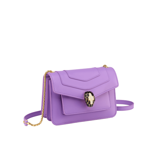 Serpenti Forever small crossbody bag in white agate calf leather with heather amethyst fuchsia grosgrain lining. Captivating snakehead closure in light gold-plated brass embellished with black and white agate enamel scales and green malachite eyes. 1082-CLb image 2