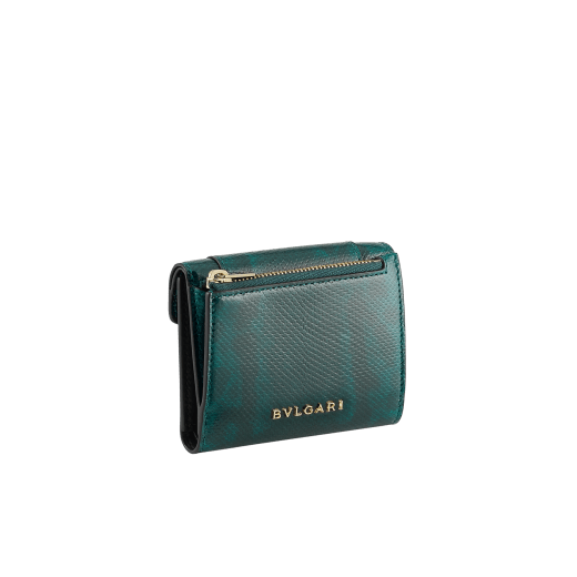 Serpenti Forever compact wallet in shiny midnight plum karung with black nappa leather interior. Captivating snakehead press-button closure in palladium-plated brass embellished with midnight plum enamel and palladium-plated brass scales and black enamel eyes. SEA-SLIM-COMPACT-R-kar image 2