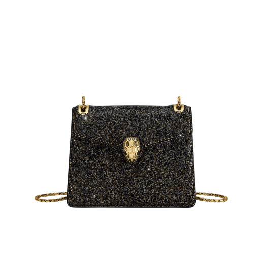 Serpenti Forever Day-to-Night small shoulder bag with black crystals inserts hand-set on suede leather with black nappa leather lining. Captivating snakehead magnetic closure in gold-plated brass embellished with black zirconia pavé and gold-plated brass scales, and black onyx eyes. 294042 image 1