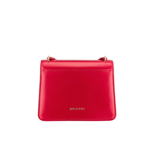 "Serpenti Forever" small maxi chain crossbody bag in Amaranth Garnet red nappa leather, with Pink Spinel fuchsia nappa leather internal lining. New Serpenti head closure in gold plated brass, finished with small red carnelian scales in the middle and red enamel eyes. 1134-MCNa image 3