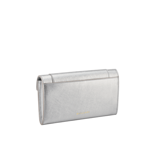 Serpenti Forever large wallet in black calf leather with emerald green nappa leather interior. Captivating snakehead magnetic closure in light gold-plated brass embellished with black enamel and light gold-plated brass scales, and black onyx eyes. SEA-LONG-WLT-R image 3