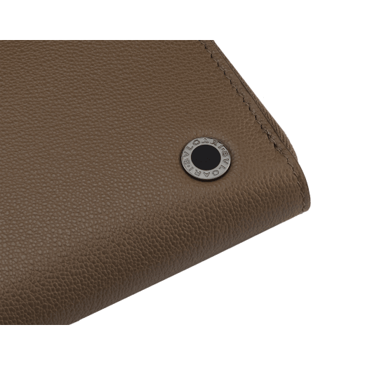 Bvlgari Bvlgari Man large zipped wallet in Urban grained calf leather, Roman granite brown on the outside and Laguna blue on the inside. Iconic dark ruthenium-plated brass embellishment with matt black enamel, and zip-around closure. BBM-WLTZIPASYMb image 4