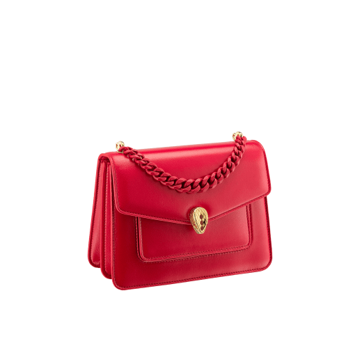 "Serpenti Forever" small maxi chain crossbody bag in peach nappa leather, with Lavender Amethyst lilac nappa leather inner lining. New Serpenti head closure in gold-plated brass, finished with small pink mother-of-pearl scales in the middle and red enamel eyes. 1134-MCNa image 2