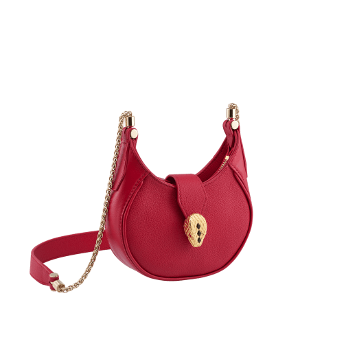 Serpenti Ellipse micro crossbody bag in soft drummed and smooth flamingo quartz pink calf leather with flamingo quartz pink gros grain lining. Captivating snakehead closure in gold-plated brass embellished with red enamel eyes. Online exclusive colour. SEA-MICROHOBOb image 1